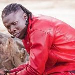 Stonebwoy pulls gun