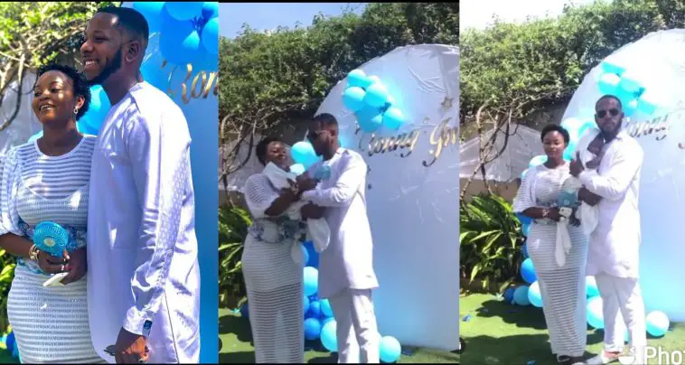 Yolo actor Aaron Adatsi outdoors his baby boy