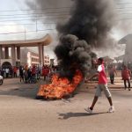 Angry NDC supporters block roads, burn tyres in protest against EC in Kumasi