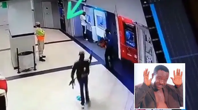 Security man calmly walks away as armed men rob a man at the ATM (Video)