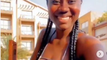 Hajia Bintu flaunts her raw chest in hot swimwear as she goes swimming