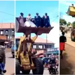 Drama as a newlywed couple and their bridesmaids are ferried in a loader [video]