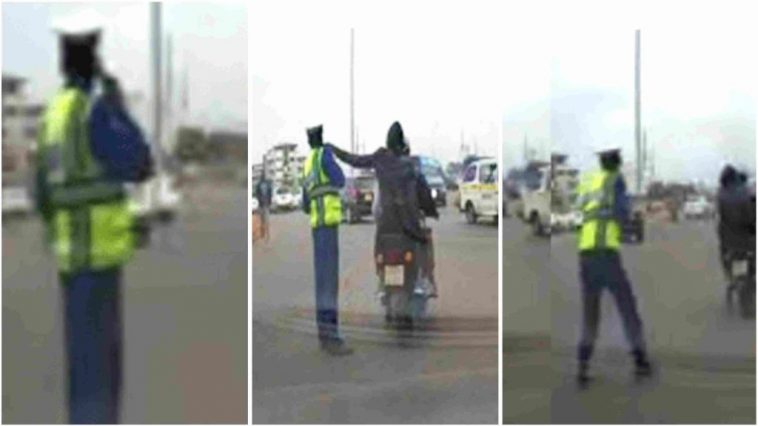 Moment motorbike riding thugs snatched phone from policeman directing traffic