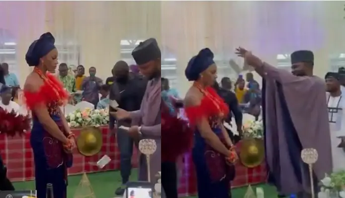 Bride refuses to smile or dance as her groom sprays money on her on their wedding day (Video)