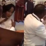 Bride angrily pushes her groom as he tries kissing her during their wedding (Video)