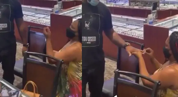 Lady kneels down and proposes to her man at jewelry store immediately after buying engagement ring (Video)