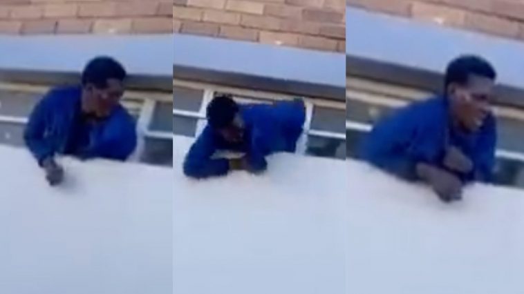Burglar cries as homeowner flogs him while he’s stuck in window he tried escaping from (Video)