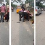 Policemen Struggle To Arrest Okada Rider As He Lies Down Firmly On His Bike (Video)