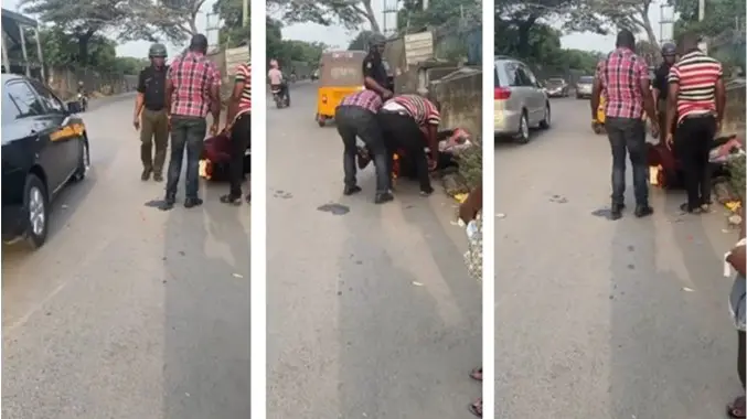 Policemen Struggle To Arrest Okada Rider As He Lies Down Firmly On His Bike (Video)