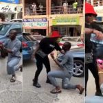 Lady angrily pours water on boyfriend in Abuja for embarrassing her by proposing in public (Video)