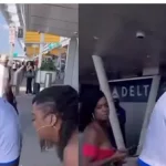 man catch woman airport girlfriend