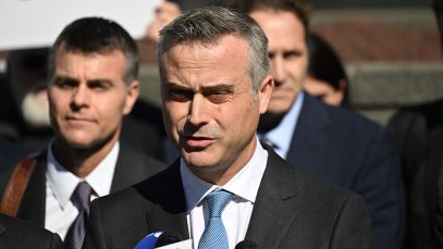 Dominion CEO John Poulos, joined by members of the Dominion Voting Systems legal team, speaks outside the Leonard Williams Justice Center in Wilmington, Delaware, on April 18. (Andrew Caballero-Reynolds/AFP/Getty Images)