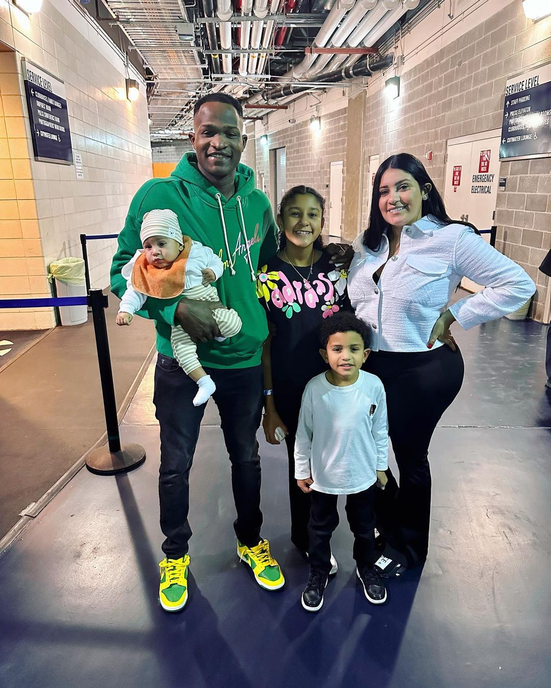 Domingo German with wife Mara Vega and children